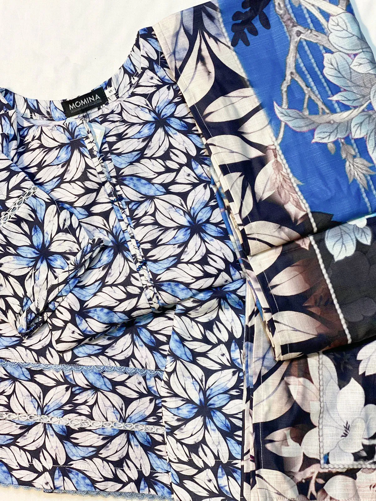 Certainly! Here is an optimized title for your e-commerce product:

Stylish Blue Soft Khaddar 3-Piece Casual Suit for Women